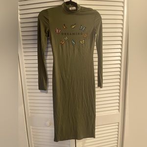 Green long sleeve stretchy knee length dress with butterflies and DREAMING text